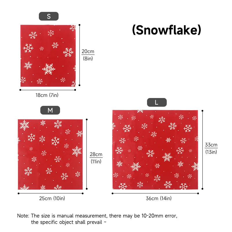 Three sizes of red reusable beeswax food wrap featuring a white snowflake pattern for plastic-free kitchen storage.