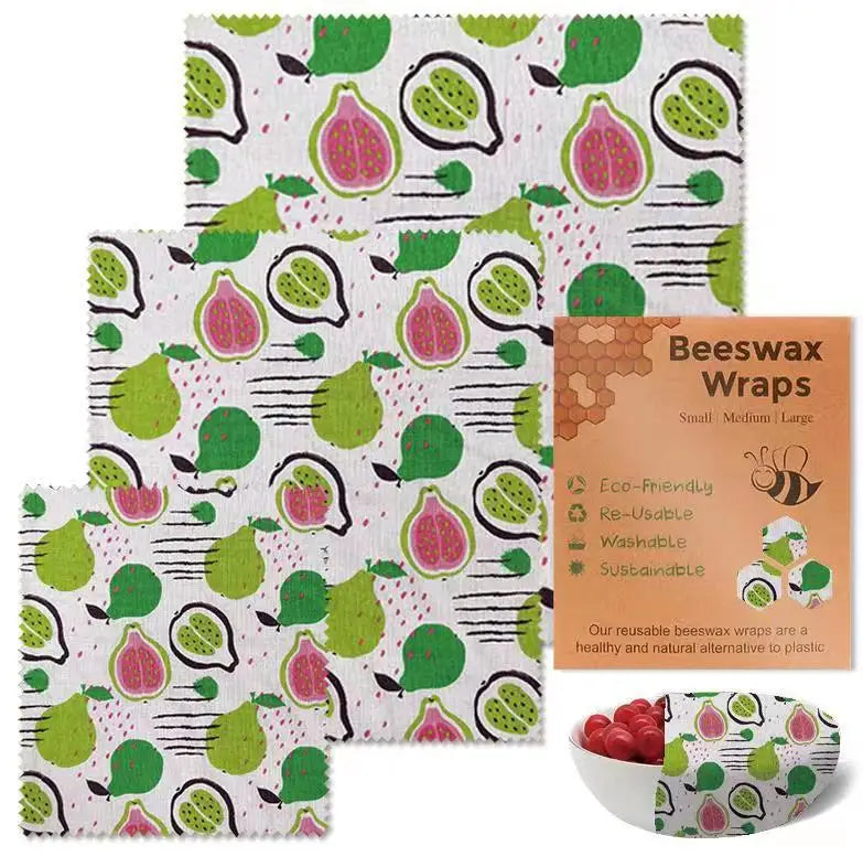 Three square reusable beeswax food wrap sheets in fig print for plastic-free kitchen storage.