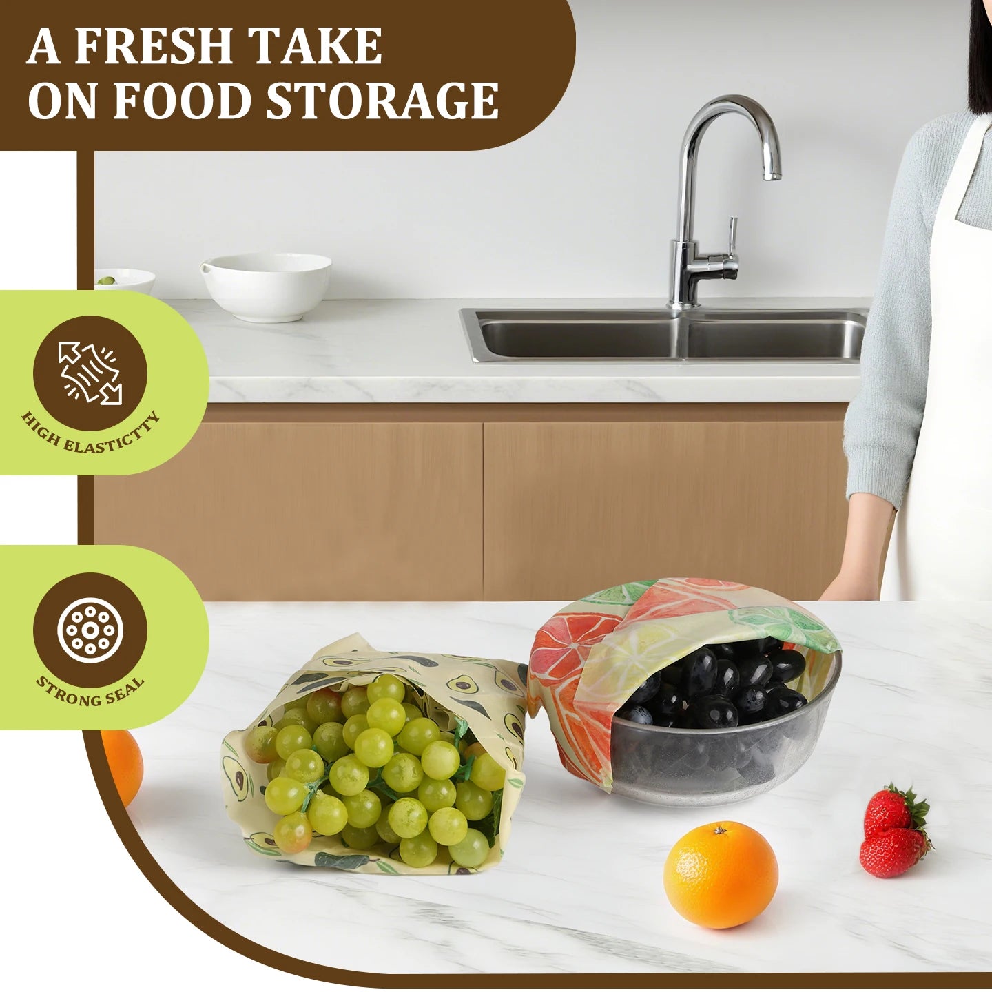 Reusable beeswax food wrap used for plastic-free kitchen storage, covering a bowl of grapes and wrapping green grapes.