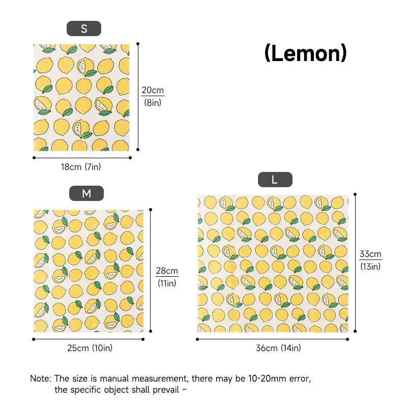 Reusable beeswax food wrap in yellow lemon pattern, showing three sizes for plastic-free kitchen storage.
